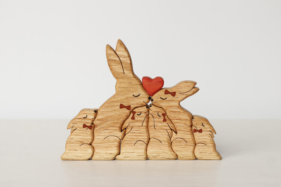 6 hares with a heart and ribbons