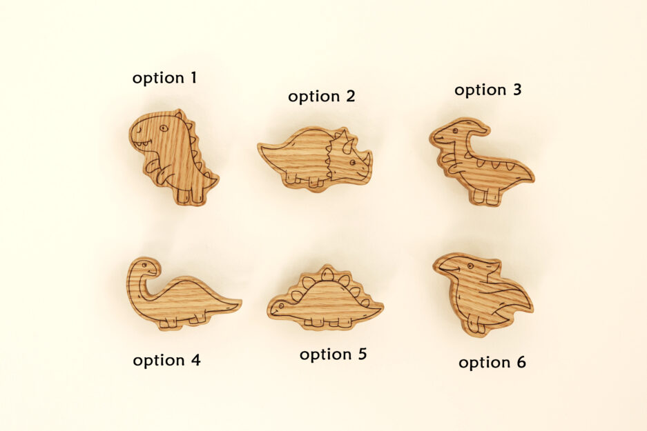 Dinosaur-shaped furniture knobs for nursery.