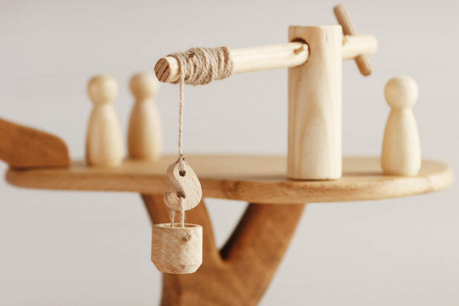 Minimalist, natural wood treehouse playset with peg dolls, perfect for Montessori and Waldorf playrooms