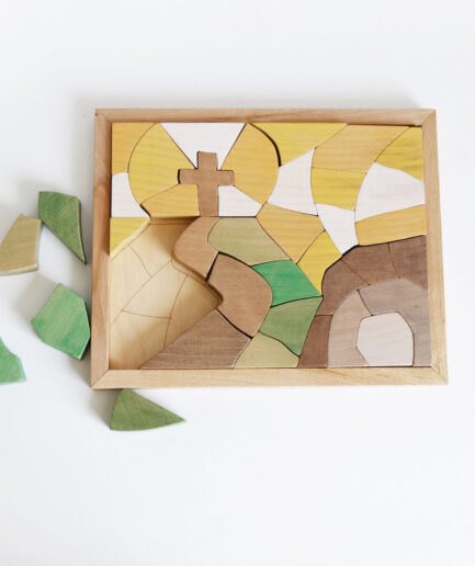 Handmade Christian Scene Puzzle featuring a cross, hills, and a winding path in a wooden frame